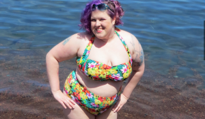 Author standing in a bikini at the beach